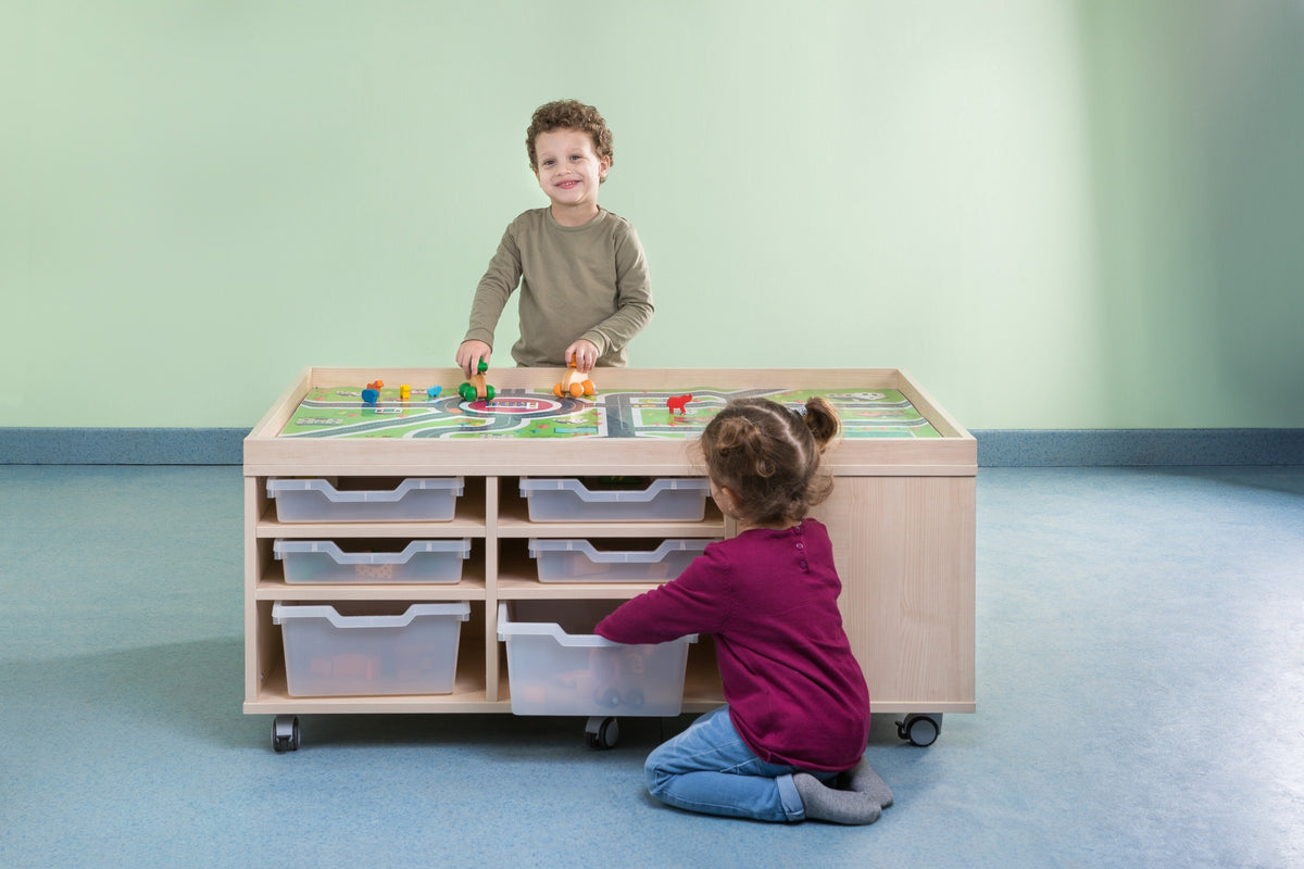 Children using a wooden art trolley with trays and art materials.