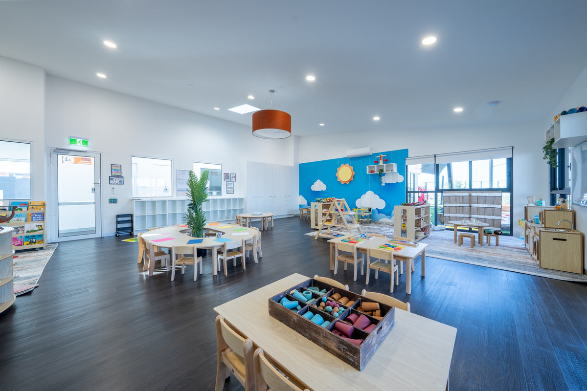 Learning Ladder Preston room with Edu Fun timber tables, chairs and low storage